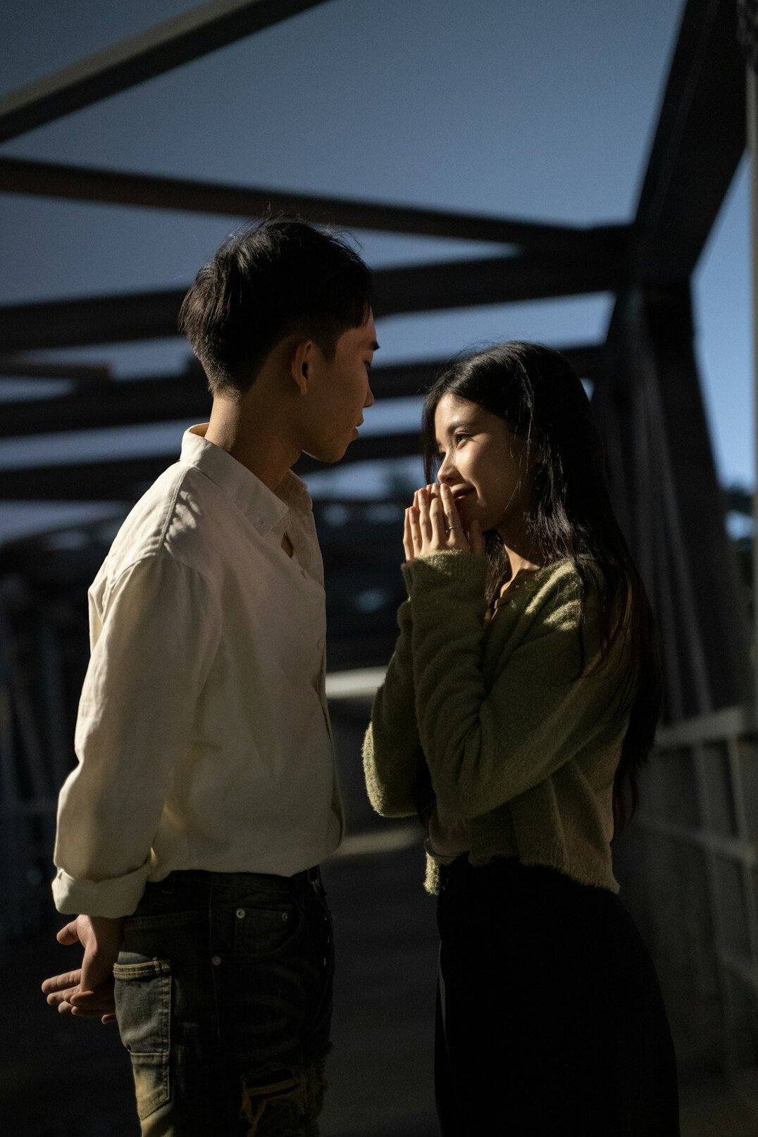 Two people engaged in an attentive face to face conversation