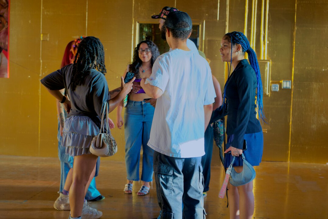 Diverse adults discussing in a workshop setting indoors